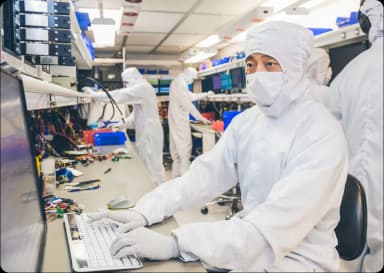 Clean‑room suits shown on DriveSavers site